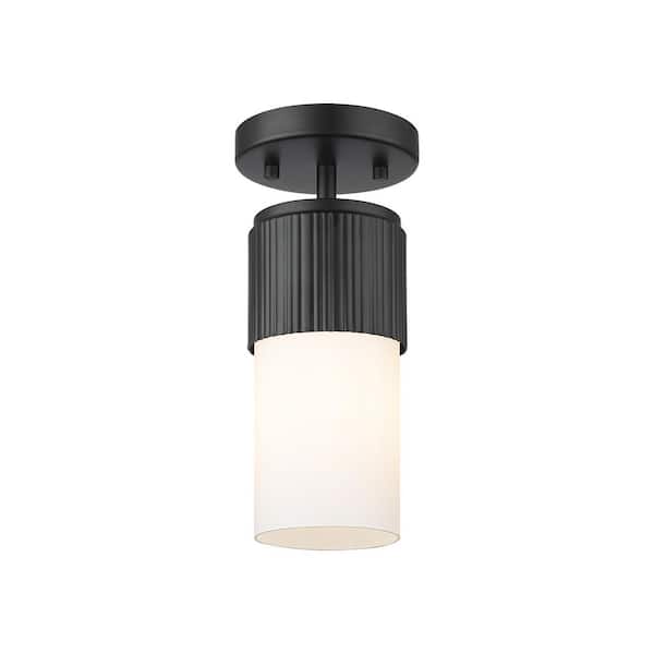 Bolivar 4 in. 1-Light Matte Black Industrial Flush Mount with Seeded Glass Shade