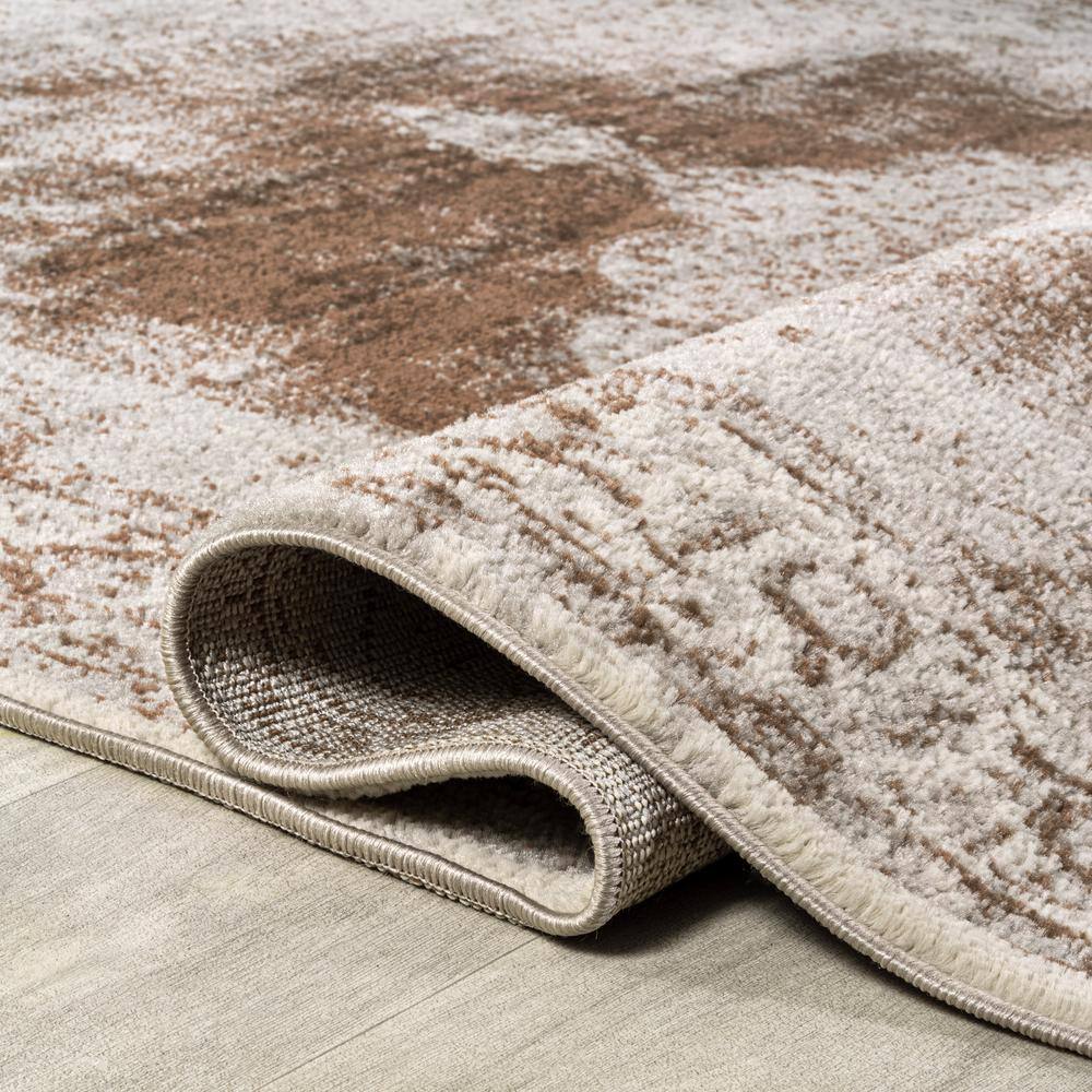 Ivory and Brown Medallion Synthetic 8' x 10' Area Rug
