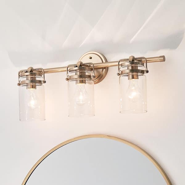 Brinley 24 in. 3-Light Champagne Bronze Vintage Bathroom Vanity Light with Clear Glass