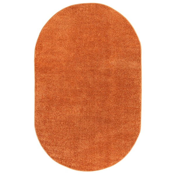 Haze Solid Low-Pile Orange 5 ft. x 8 ft. Oval Area Rug