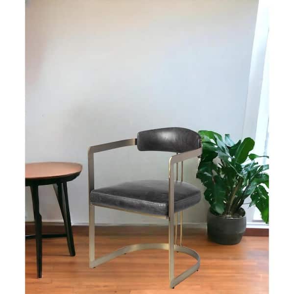 HomeRoots Black And Gold Upholstered Leather Open Back Arm Chair