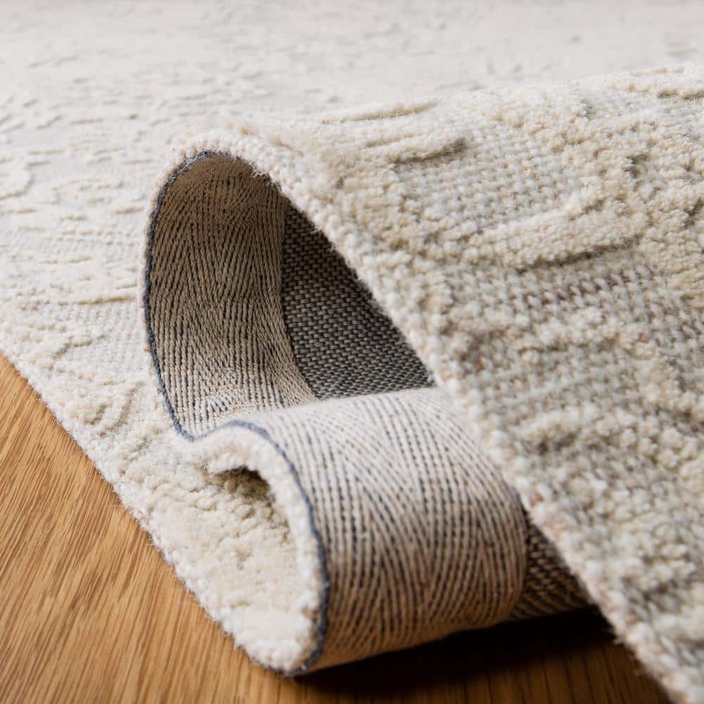Ivory and Beige 4' x 6' Handmade Wool Abstract Tufted Rug
