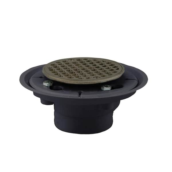 JONES STEPHENS 2 in. x 3 in. PVC Shower/Floor Drain with Brass Tailpiece and 4 in. Round Brushed Nickel Strainer