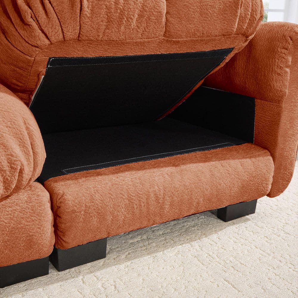 Close-up detail of the textured orange chenille armrest of the sofa.