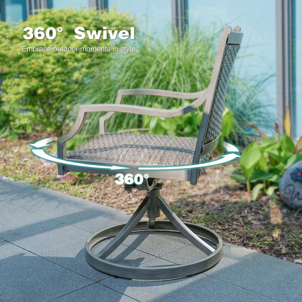 Outdoor swivel chair with weathered teak finish and gray cushion.