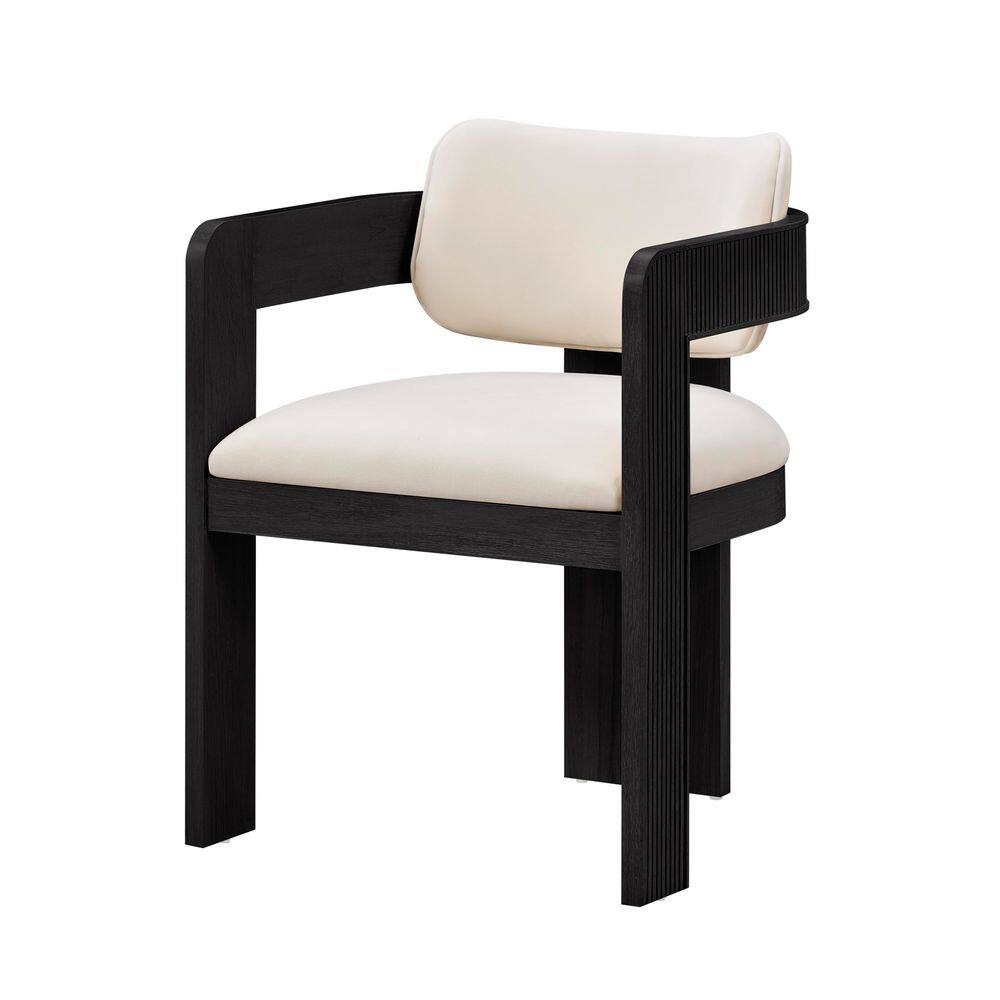 Dining chair with black wood and reeded back.