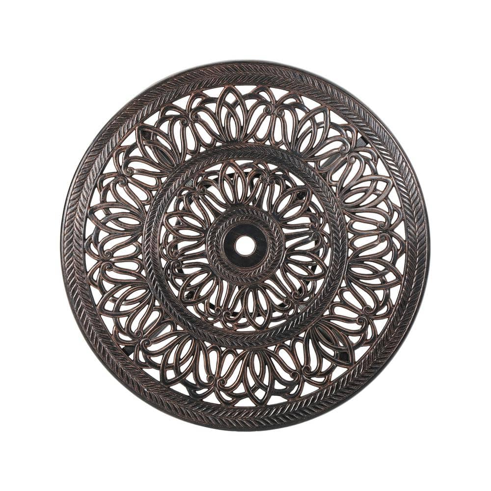 Top view of the intricate lattice pattern on a shiny copper patio table.