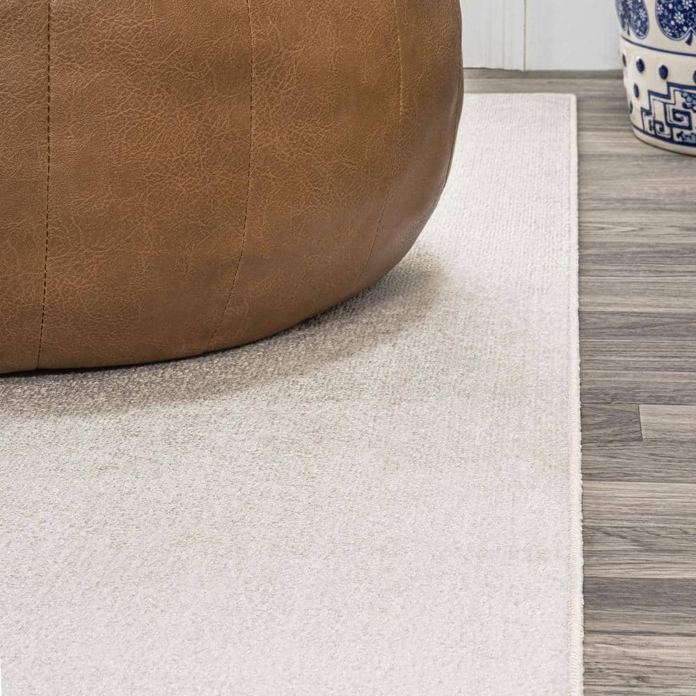 Cream 4' x 6' Synthetic Washable Rectangular Area Rug