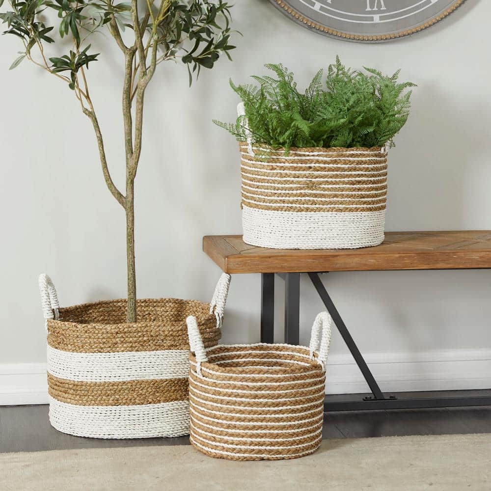 https://images.thdstatic.com/productImages/9a4b75e2-1740-50a0-8eb8-8d68debd5762/svn/brown-cosmoliving-by-cosmopolitan-storage-baskets-042415-64_1000.jpg
