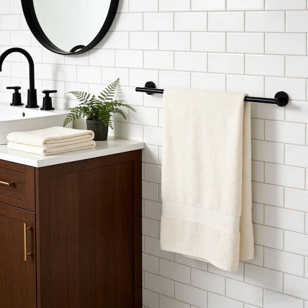 32 in. Stainless Steel Wall Mounted Single Towel Bar in Matte Black