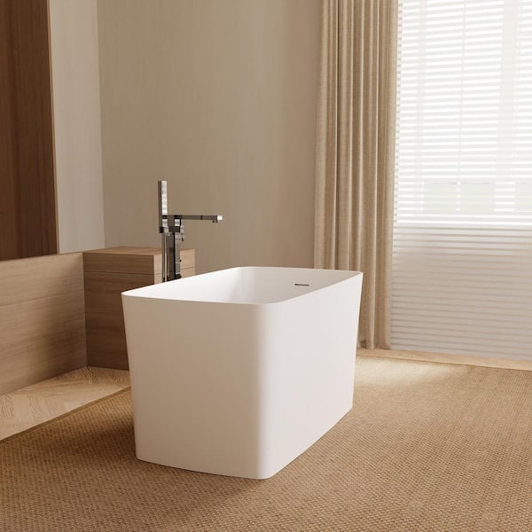 Staykiwi 47 in. x 27 in. Solid Surface Stone Resin Freestanding Soaking Bathtub with Center Drain in White