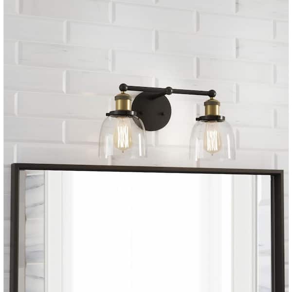 Home Decorators Collection Evelyn 16.25 in. 2-Light Artisan Bronze Industrial Vanity with Clear Glass Shades