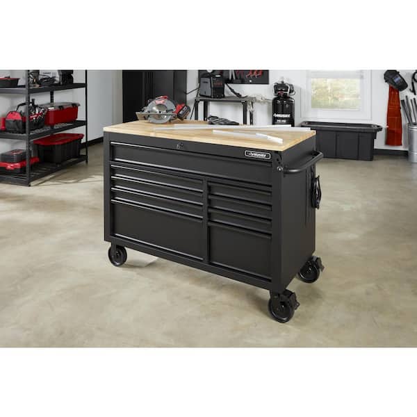 https://images.thdstatic.com/productImages/9a615898-8f1f-4795-a0aa-bfe2478a2c3c/svn/matte-black-with-black-trim-husky-mobile-workbenches-holc5209bb1m-a0_600.jpg
