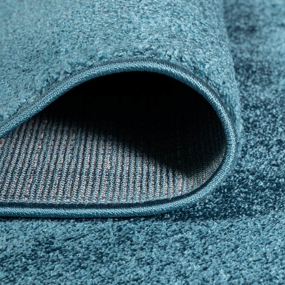 Turquoise Reversible Solid Synthetic Low-Pile Area Rug