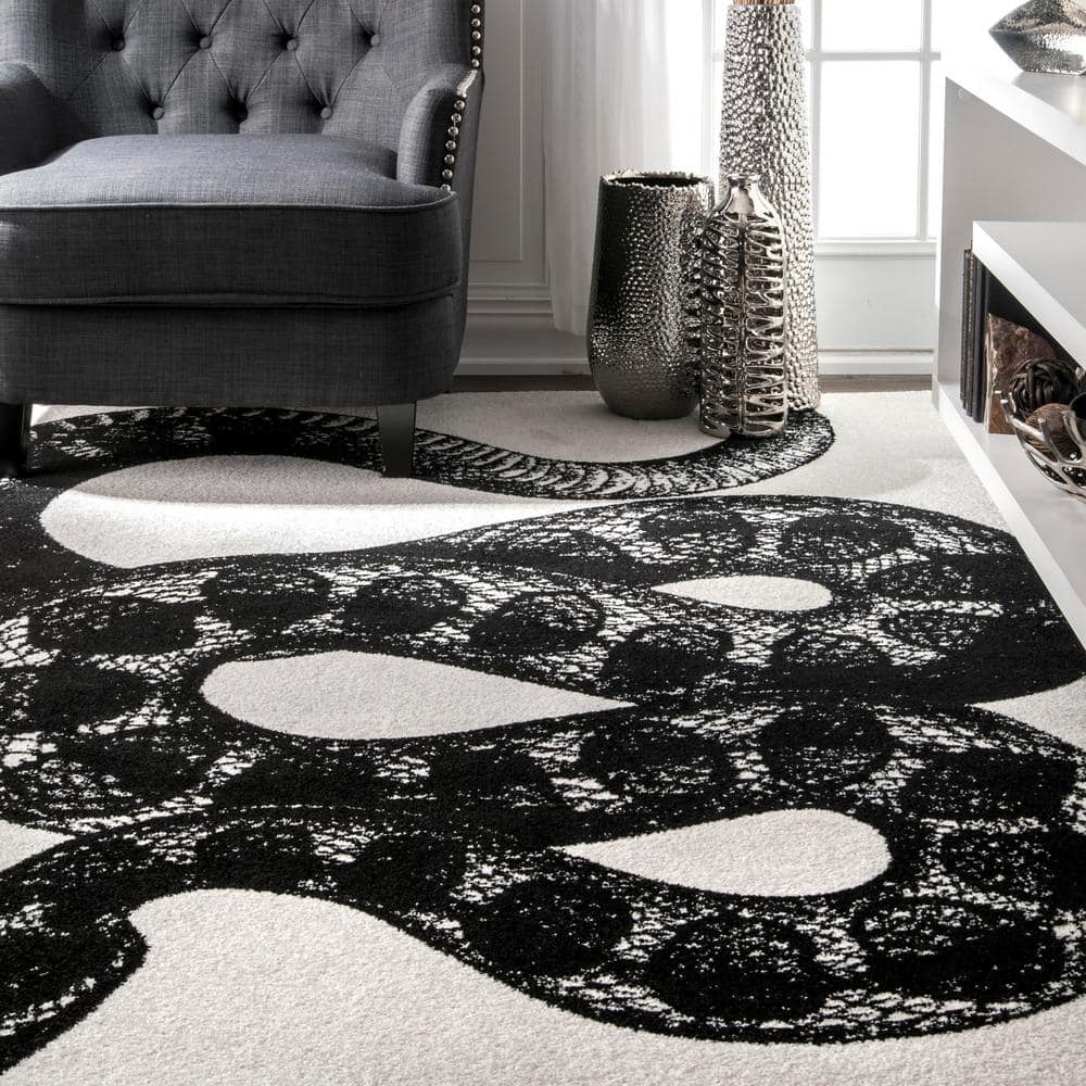Serpentine Chic Black and White Synthetic Area Rug, 5' x 8'