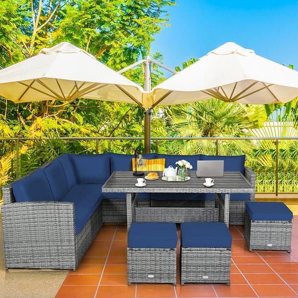 Liviza 7-Piece Wicker Outdoor Sectional Set with Navy Cushions and Dining Table