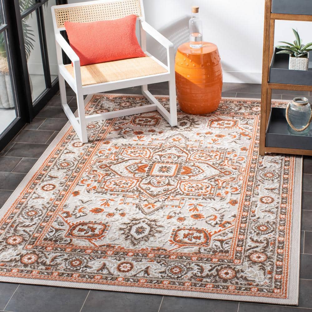 Beige and Orange Floral Synthetic Rectangular Area Rug 5'5" x 7'7"