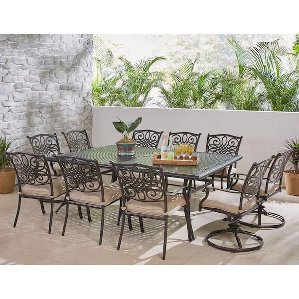 Hanover Traditions 11-Piece Aluminum Outdoor Dining Set with 4 Swivel Rockers and Tan Cushions