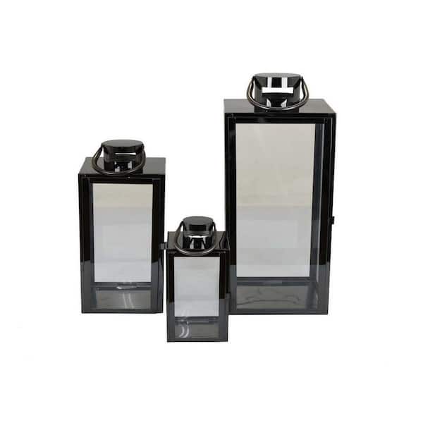 Benjara Black Metal Decorative Lanterns with Sleek Curved Handlesand Glass Panel (Set of 3)