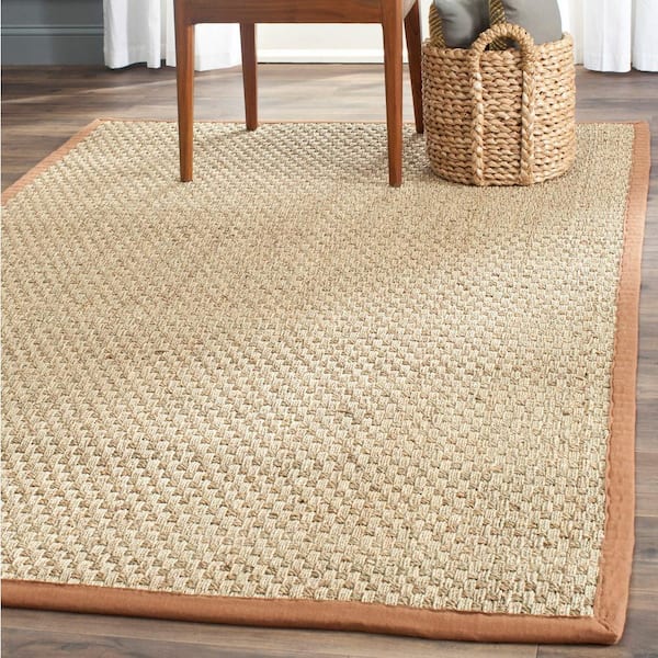 https://images.thdstatic.com/productImages/9abe28c7-d177-425e-9464-3cc5001b76b1/svn/beige-brown-safavieh-area-rugs-nf114b-3-31_600.jpg
