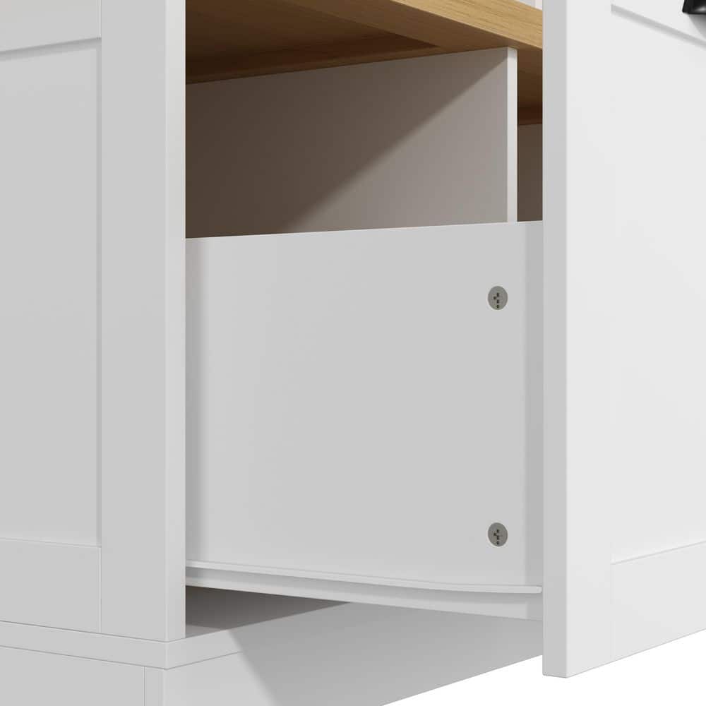Interior view of a white cabinet showing a shelf and mounting screws.