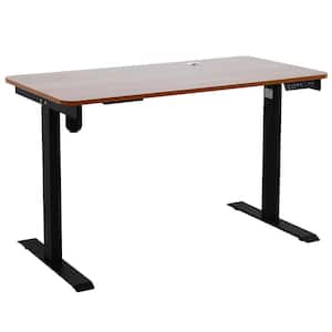 Standing Desk, Electric Height Adjustment with 24 in. D x 55 in. L - 1 in. Thick Cherry Laminated Top - Black