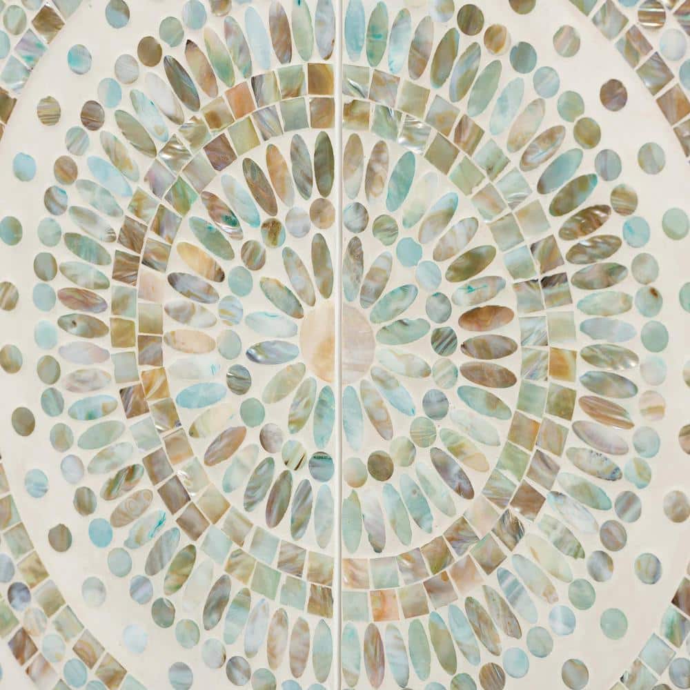 Close-up detail of the mother of pearl mosaic sunburst pattern.