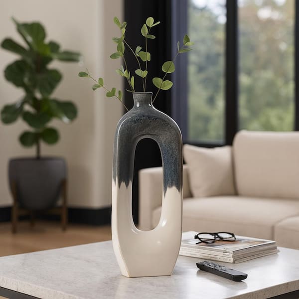 26 in. Blue and White Ceramic Curvy Open Cut-out Decorative Vase