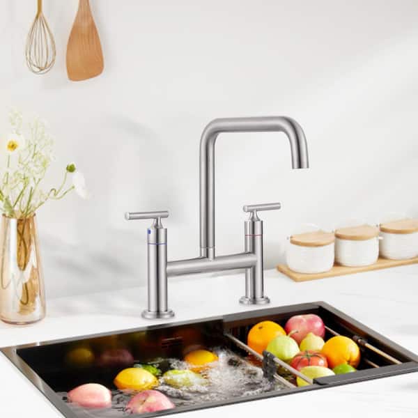 Double Handle 2-Hole Solid Brass Bridge Kitchen Faucet with 360° Rotation Spout in Brushed Nickel