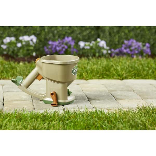 Scotts - Whirl Hand-Powered Spreader Holds up to 1,500 sq.ft., Handheld Spreader for Seed, Fertilizer, Salt and Ice Melt