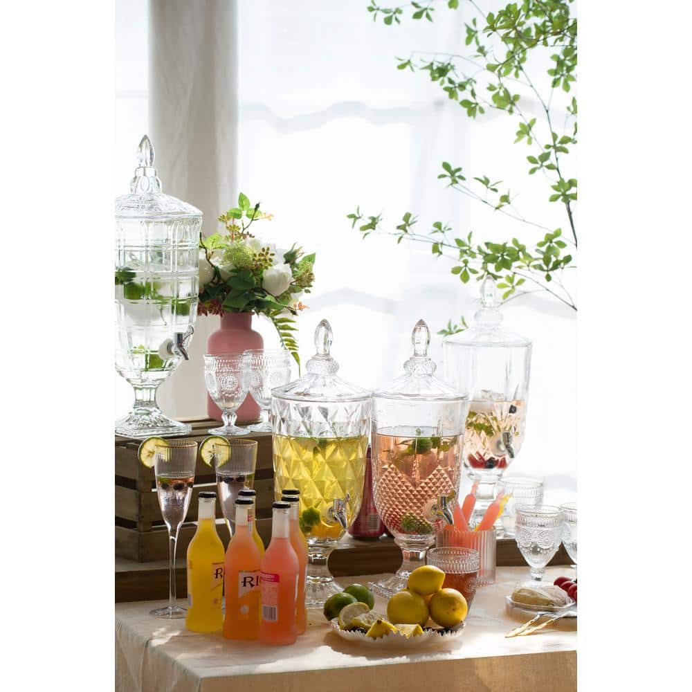 Elegant Clear Glass Beverage Dispenser with Polished Silver Lid