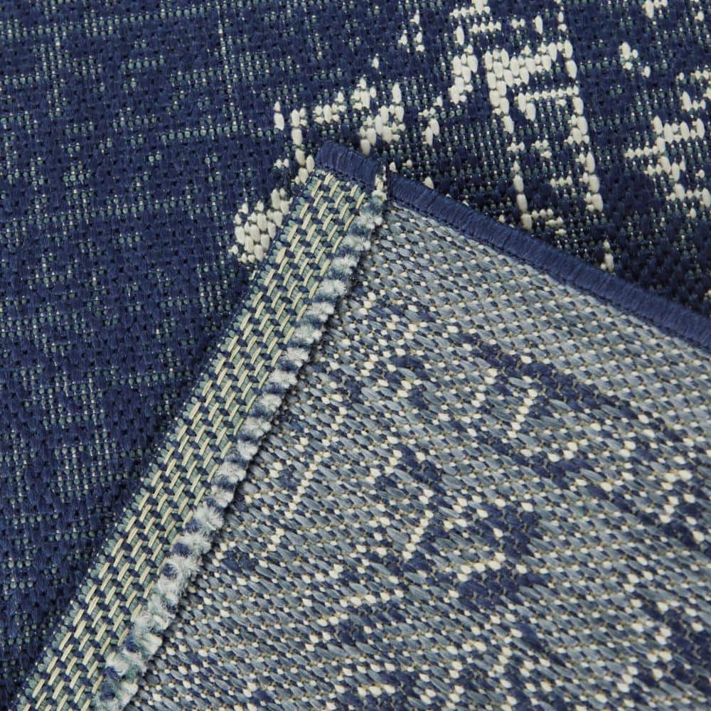 Blue and White Synthetic Oriental 8' x 10' Area Rug