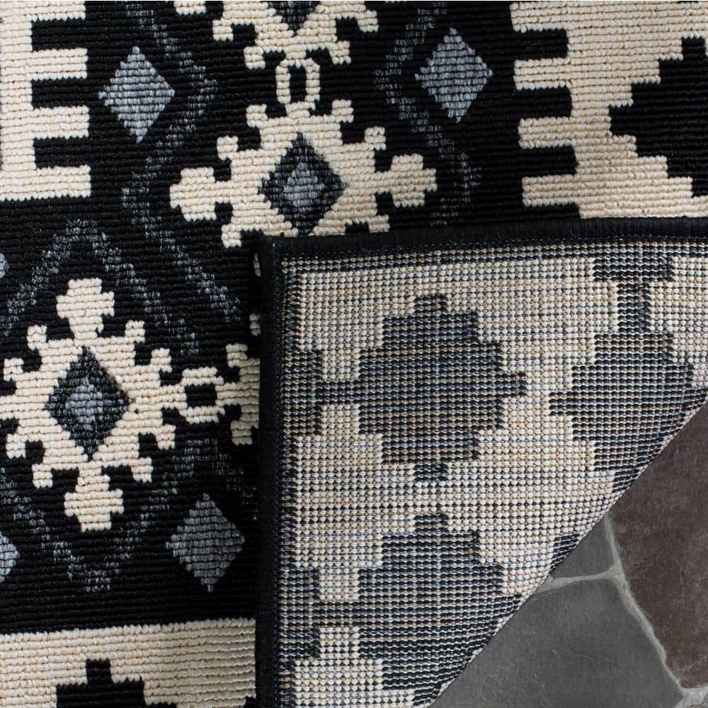 Veranda Black and Cream Synthetic 9' x 12' Easy-Care Outdoor Rug
