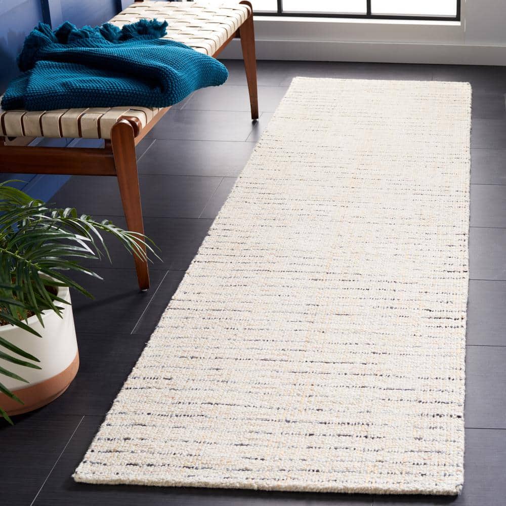 Abstract 2 ft. x 6 ft. Ivory/Blue Speckled Runner Rug price history on PriceWatchPro