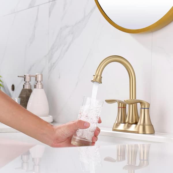 Staykiwi 4 in. Centerset Double Handle Mid Arc Bathroom Faucet with Drain Kit Included in Brushed Gold