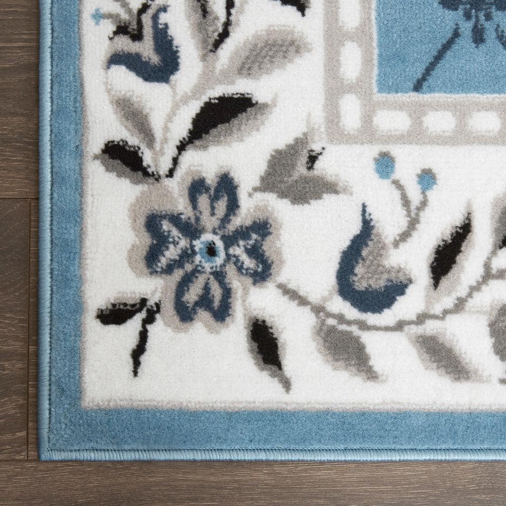 Aydin Blue and Ivory Synthetic Traditional Area Rug