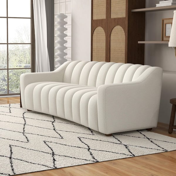 https://images.thdstatic.com/productImages/9b66a118-894c-4916-a121-0460c6c4354f/svn/ivory-ashcroft-furniture-co-sofas-couches-sof-bari-bou-crm-e1_600.jpg