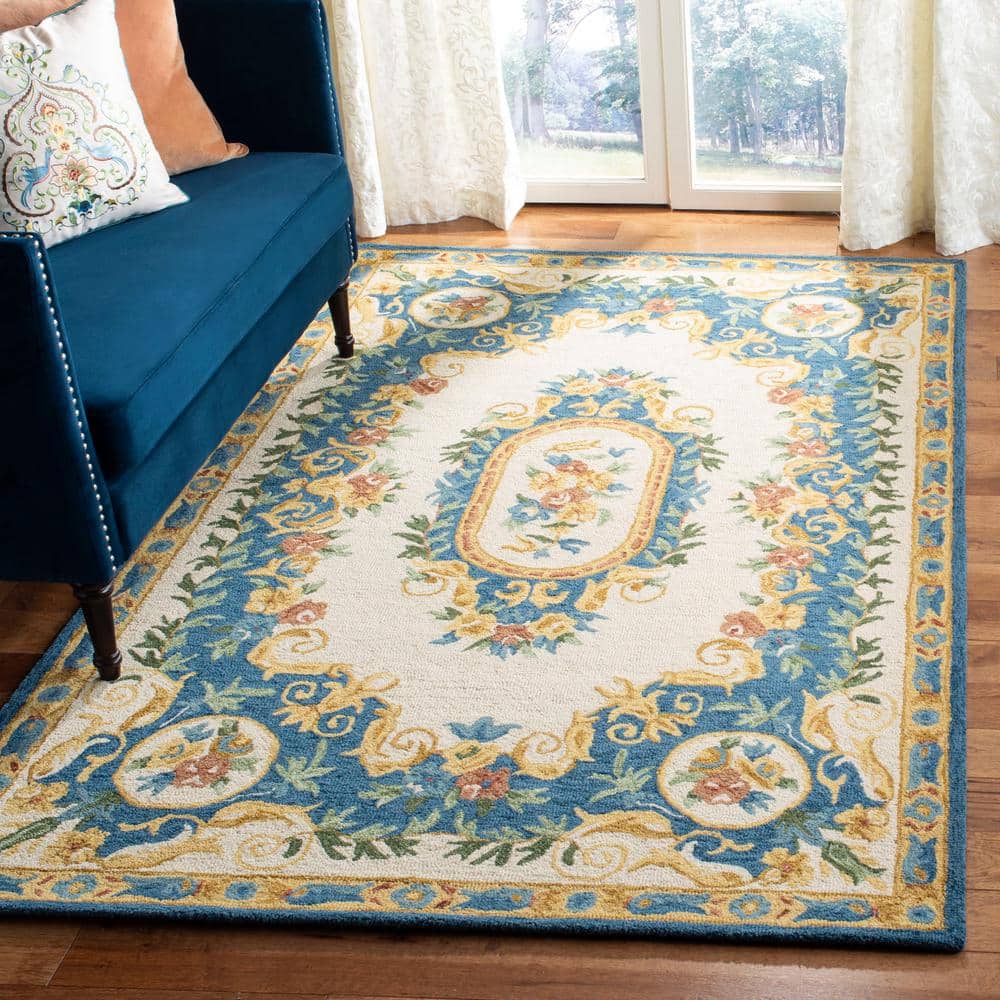Handmade Cream and Blue Floral Wool Area Rug