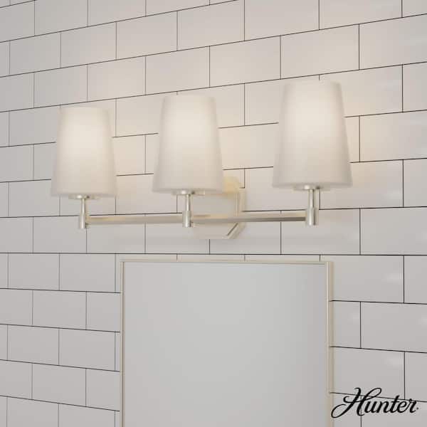 Hunter Nolita 24.5 in. 3-Light Brushed Nickel Vanity Light with Cased White Glass Shades