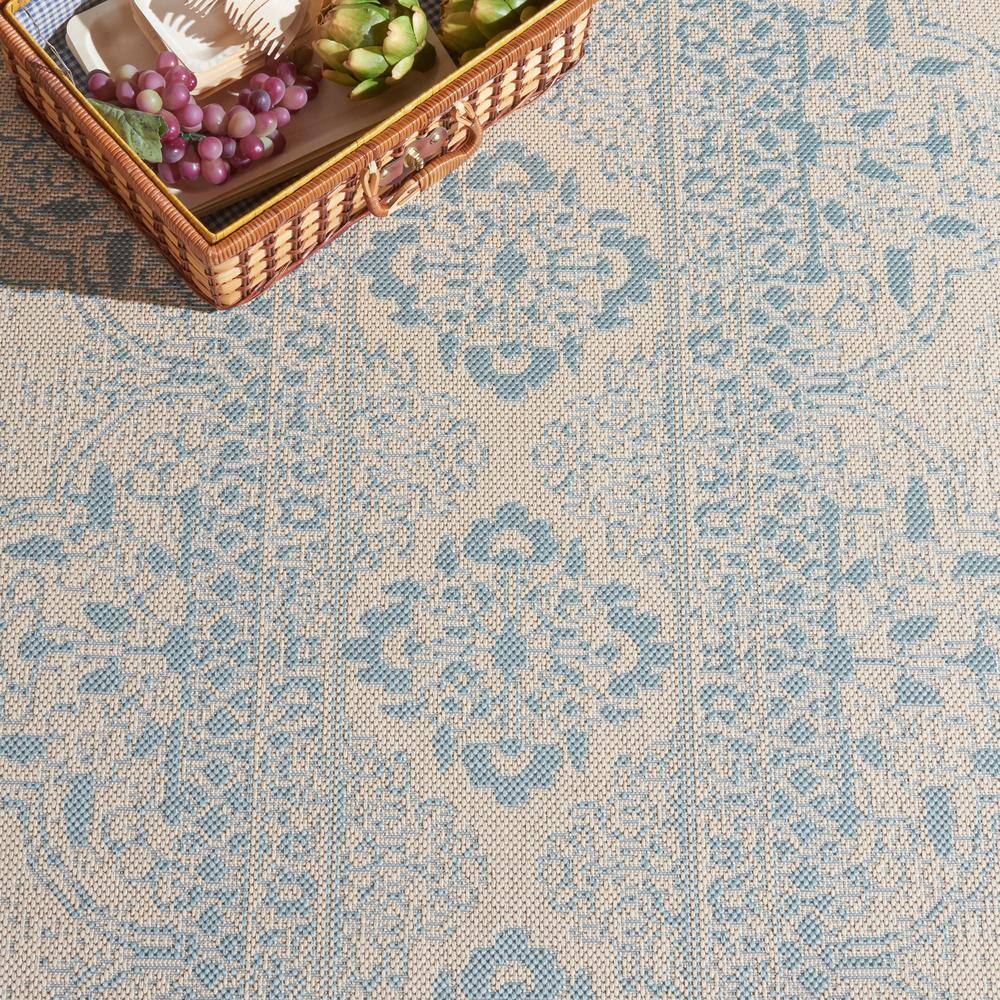 Aqua and Cream Geometric Indoor/Outdoor Rug, 2'2" x 4'