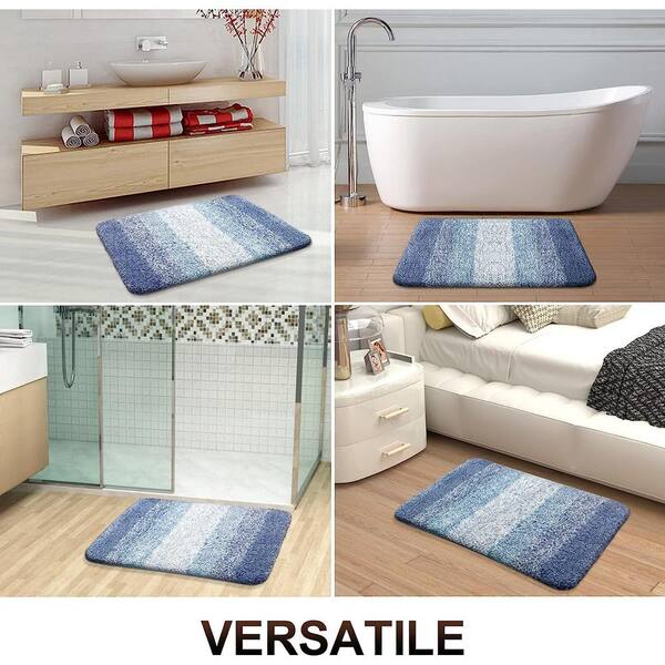 https://images.thdstatic.com/productImages/9bb7b156-95bd-416d-8fa5-0b5fe70684ff/svn/blue-afoxsos-bathroom-rugs-bath-mats-snph004in267-31_600.jpg