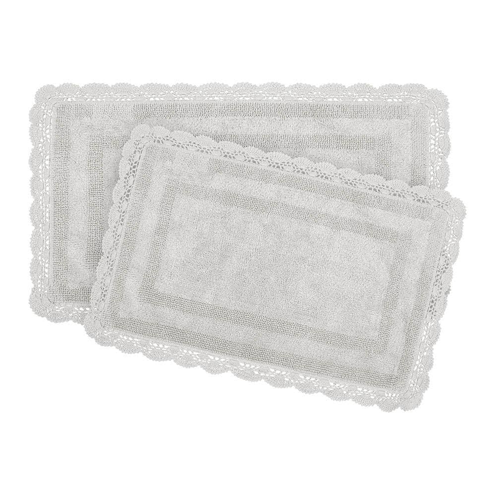 https://images.thdstatic.com/productImages/9be73a12-23f4-4429-9f82-c9a7c5eb186a/svn/light-grey-laura-ashley-bathroom-rugs-bath-mats-laymb007187-64_1000.jpg