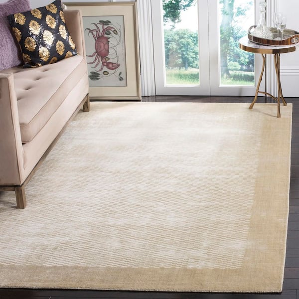Mirage 6 ft. x 9 ft. Taupe Solid Color Border Geometric Area Rug