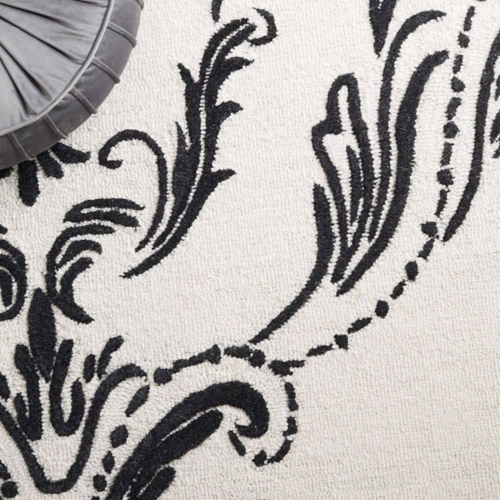Ivory and Black Floral Hand-Tufted Wool Round Rug