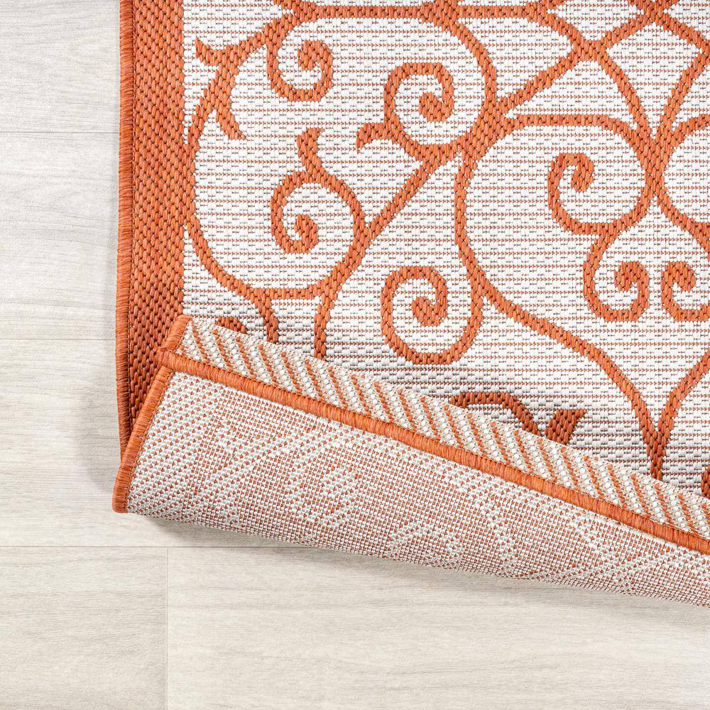 Cream and Orange 8' x 10' Synthetic Flat Woven Reversible Rug
