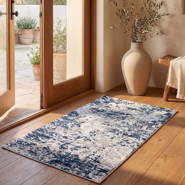 Amelia 9 ft. x 12 ft. Ivory/Navy Distressed Abstract Area Rug