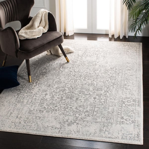 Evoke Ivory/Gray 7 ft. x 9 ft. Distressed Border Medallion Area Rug