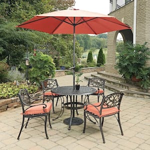 Sanibel Rust Bronze 7-Piece Cast Aluminum Round Outdoor Dining Set with Coral Cushions and Umbrella
