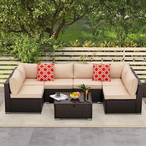 7-Piece Wicker Outdoor Sectional Set with Glass Table Beige Cushions and Pillows