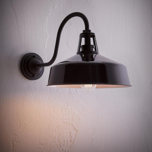 https://images.thdstatic.com/productImages/9c2a5b46-a62d-4679-a278-7680a6ccbb27/svn/gloss-black-progress-lighting-outdoor-sconces-p560237-031-a0_600.jpg